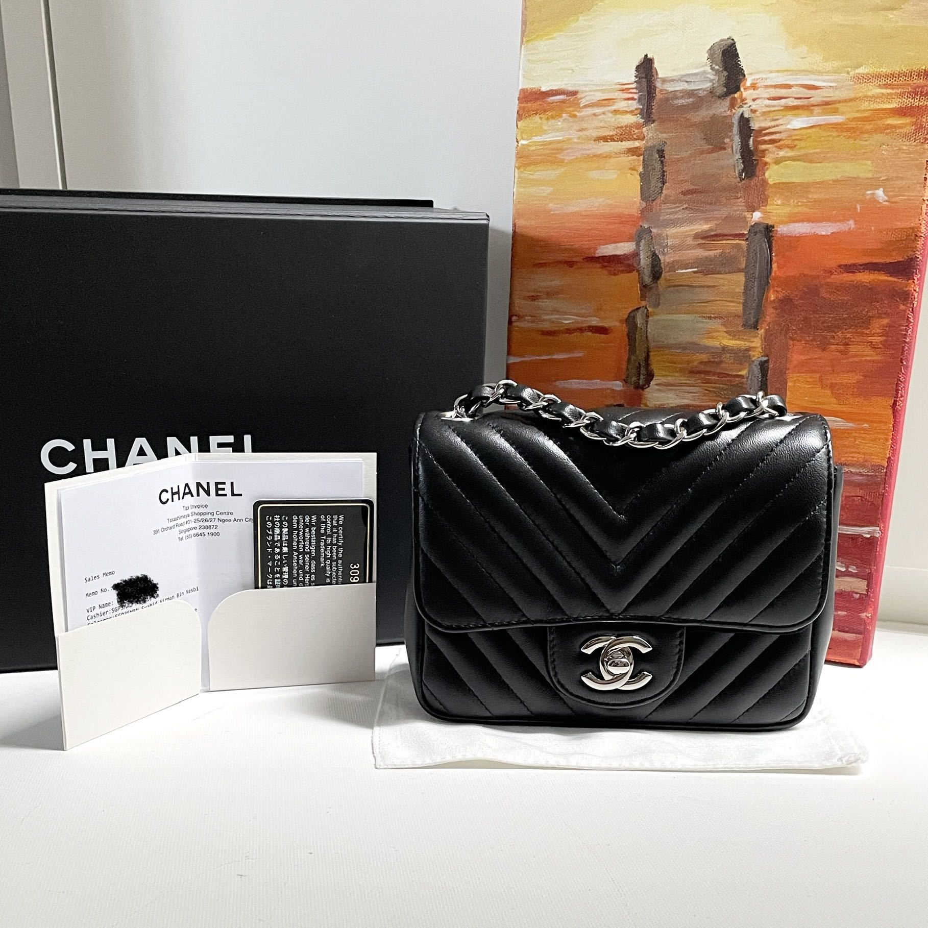 Chanel Chevron Quilted Rectangular Mini Flap Bag in Black Lambskin with  Shiny Silver Hardware - SOLD