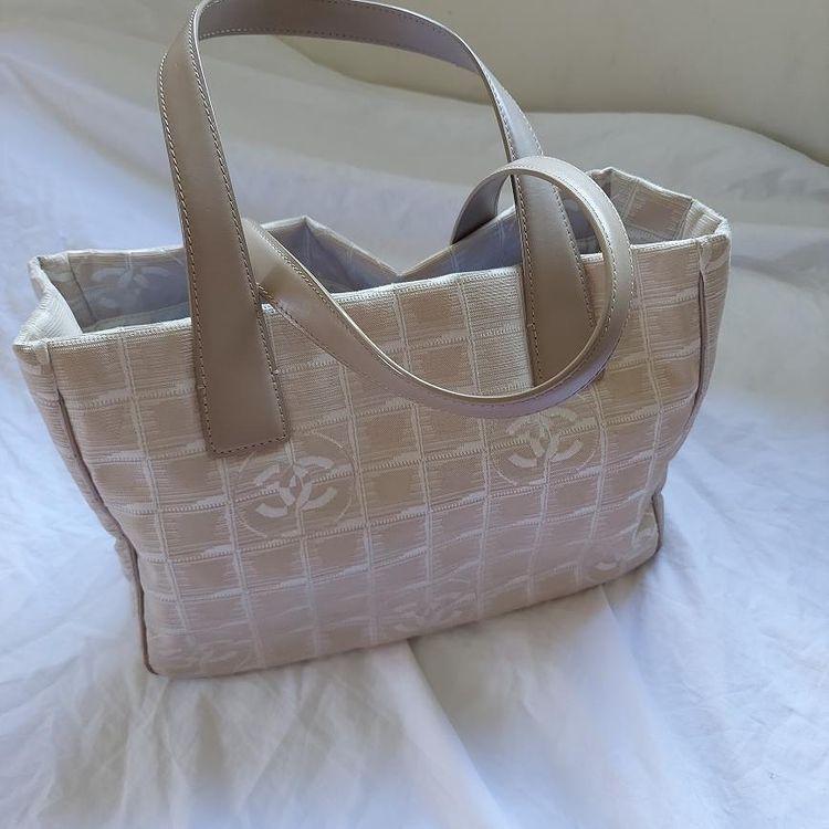 Vintage Chanel New Travel Line Canvas tote bag, Luxury, Bags & Wallets on  Carousell