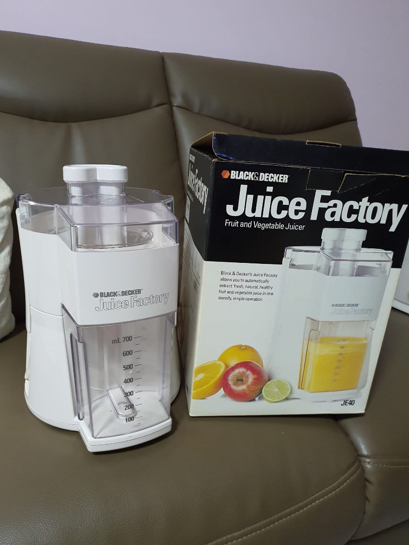 Brand new juicer, comes in box with instruction manual., TV & Home