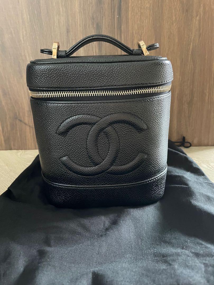 Chanel Vintage Black Vanity Bag caviar (Category: Bags & Wallets) located in Singapore. Submitted by clovestoshop (Listing ID 1127083875, Image 1). Description: *Full set rare with holo and card *Excellent vintage condition with no rubs or scratches on the exterior *light scratches on the D ring that is inevitable with use and vintage * matching chain all ready to use as cross body Price reflects conditions. Fussy buyers don’t enquire. Sincere bu