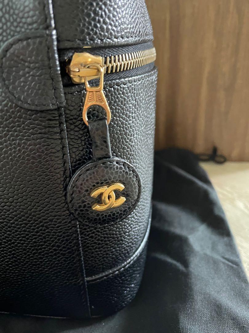 Chanel Vintage Black Vanity Bag caviar (Category: Bags & Wallets) located in Singapore. Submitted by clovestoshop (Listing ID 1127083875, Image 3). Description: *Full set rare with holo and card *Excellent vintage condition with no rubs or scratches on the exterior *light scratches on the D ring that is inevitable with use and vintage * matching chain all ready to use as cross body Price reflects conditions. Fussy buyers don’t enquire. Sincere bu