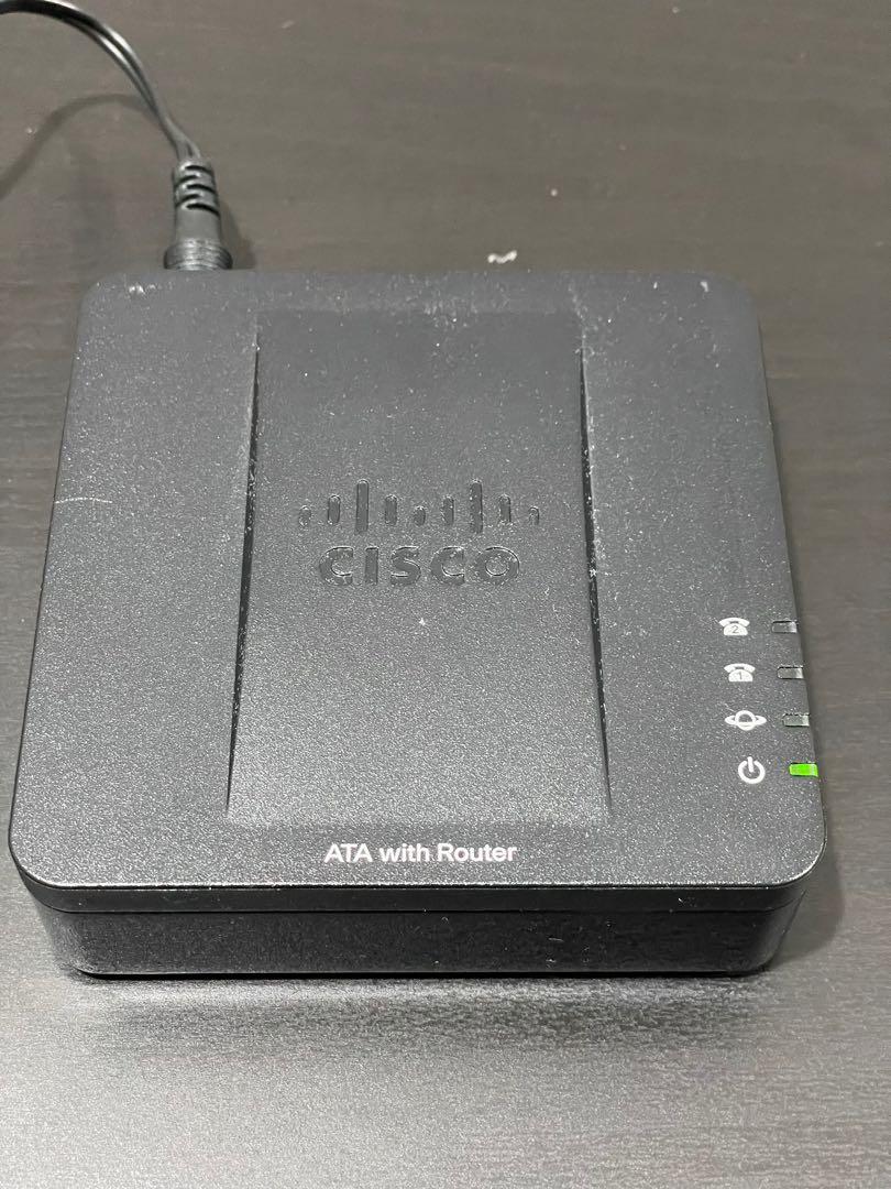Cisco SPA122 ATA with Router VOIP adapter for analogue phones, Computers   Tech, Office  Business Technology on Carousell