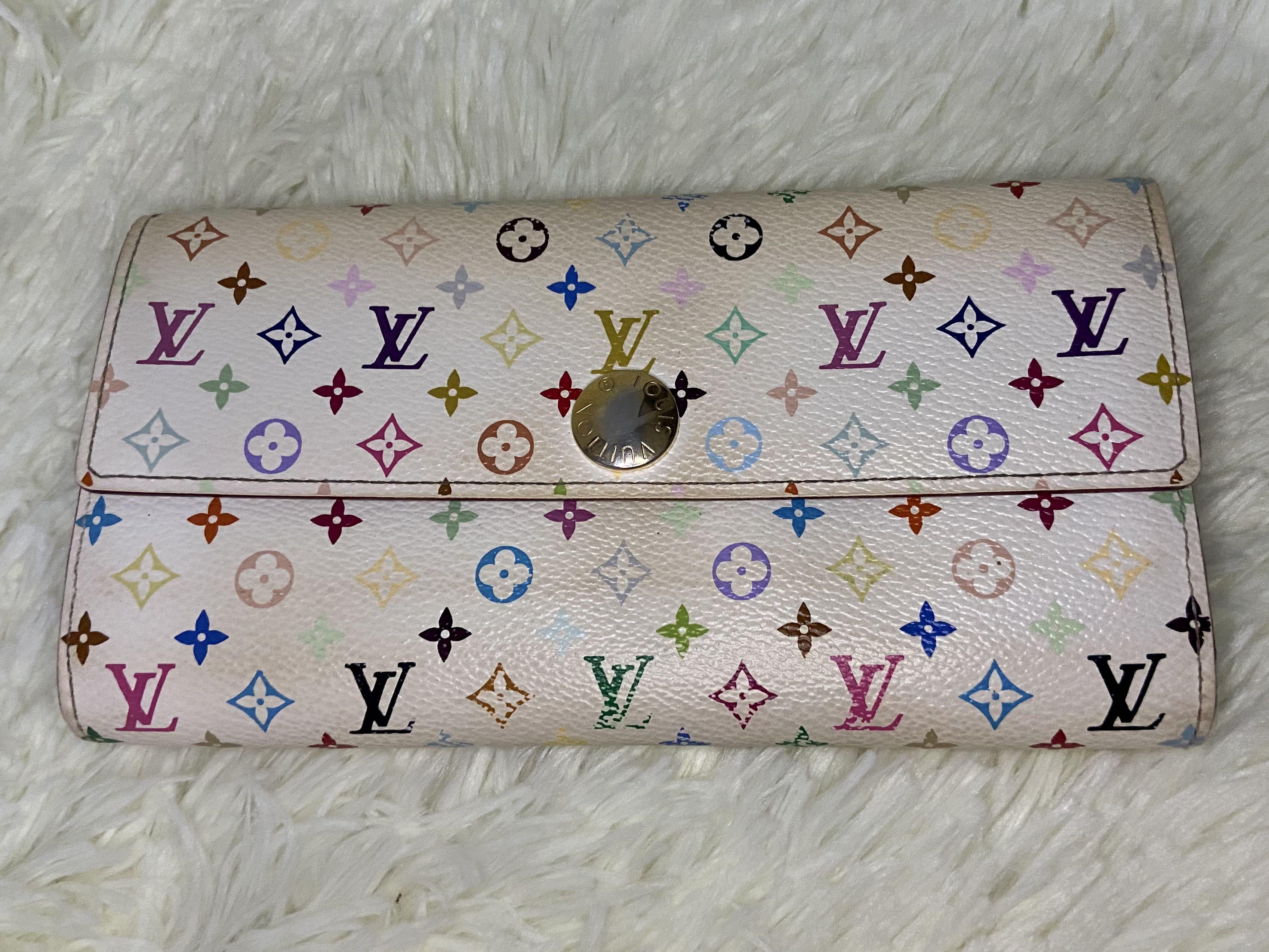 Louis Vuitton Multicolor Wallet (Category: Luxury Bags & Wallets) located in Las Pinas. Submitted by Le.Pattie.Luxe (Listing ID 1126833548, Image 2). Description: Authentic LV Multicolor Sarah Wallet 💕Php 12,000💕 Pink interior Size: 19 x 10 x 2cm (LxHxW) Inclusions: box and dustbag -10 card slots -3 bill compartments -1 zipper pocket.