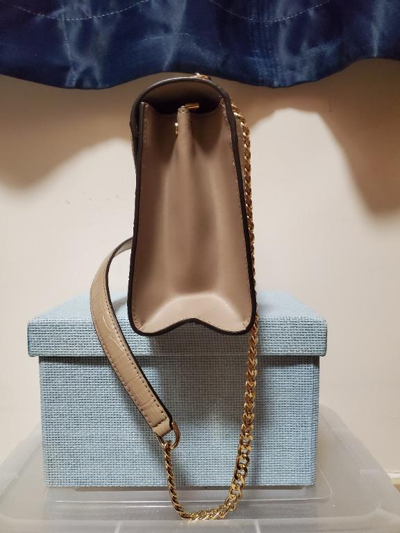 Whitney large logo and hotsell embossed leather convertible shoulder bag