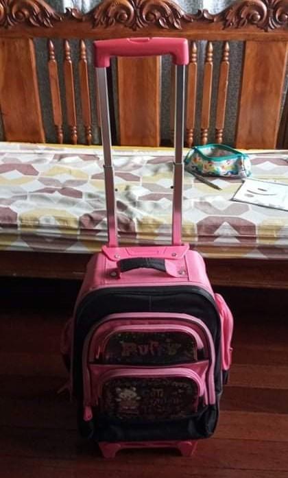 Pink Stroller school bag with wheels (Category: Strollers) located in Marikina City. Submitted by entropymarketing (Listing ID 1127005783, Image 2). Description: Pink Stroller school bag with wheels Size 12 x 8x 18 in One year lang po nagamit then nagpandemic na po RFS Decluttering Address 10 Nalugod St Sto Nino Marikina.