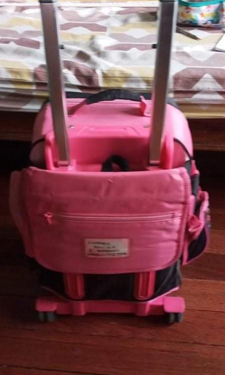Pink Stroller school bag with wheels (Category: Strollers) located in Marikina City. Submitted by entropymarketing (Listing ID 1127005783, Image 3). Description: Pink Stroller school bag with wheels Size 12 x 8x 18 in One year lang po nagamit then nagpandemic na po RFS Decluttering Address 10 Nalugod St Sto Nino Marikina.