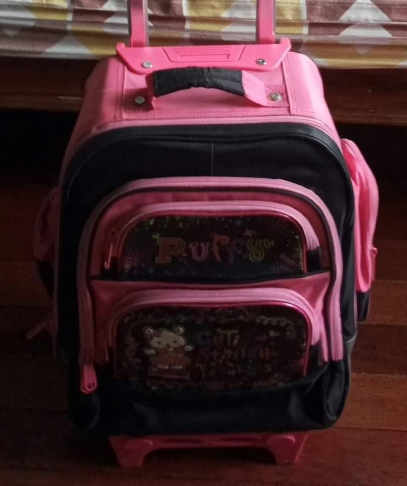 Pink Stroller school bag with wheels (Category: Strollers) located in Marikina City. Submitted by entropymarketing (Listing ID 1127005783, Image 1). Description: Pink Stroller school bag with wheels Size 12 x 8x 18 in One year lang po nagamit then nagpandemic na po RFS Decluttering Address 10 Nalugod St Sto Nino Marikina.