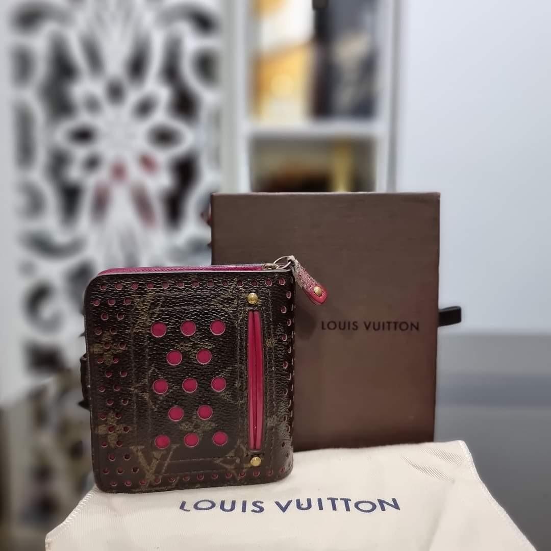 Authentic Louis Vuitton Limited Edition Fuchsia (Category: Luxury Bags & Wallets) located in Caloocan City. Submitted by lujosacollection (Listing ID 1127165812, Image 2). Description: 100%Authentic/Original Preloved Louis Vuitton Limited Edition Fuchsia Monogram Perforated Compact Zip Wallet In good condition Signs of usage Comes with box and dustbag.