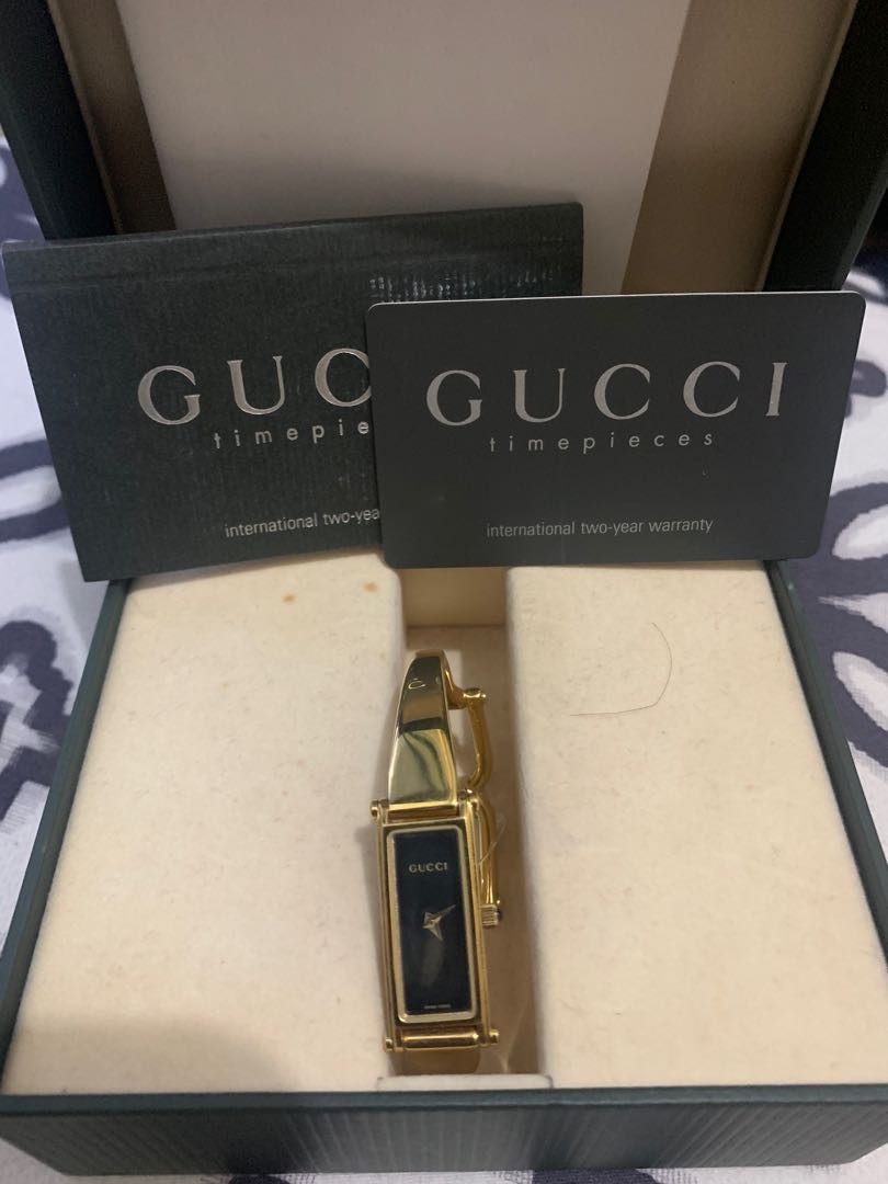 gucci gold bangle watch