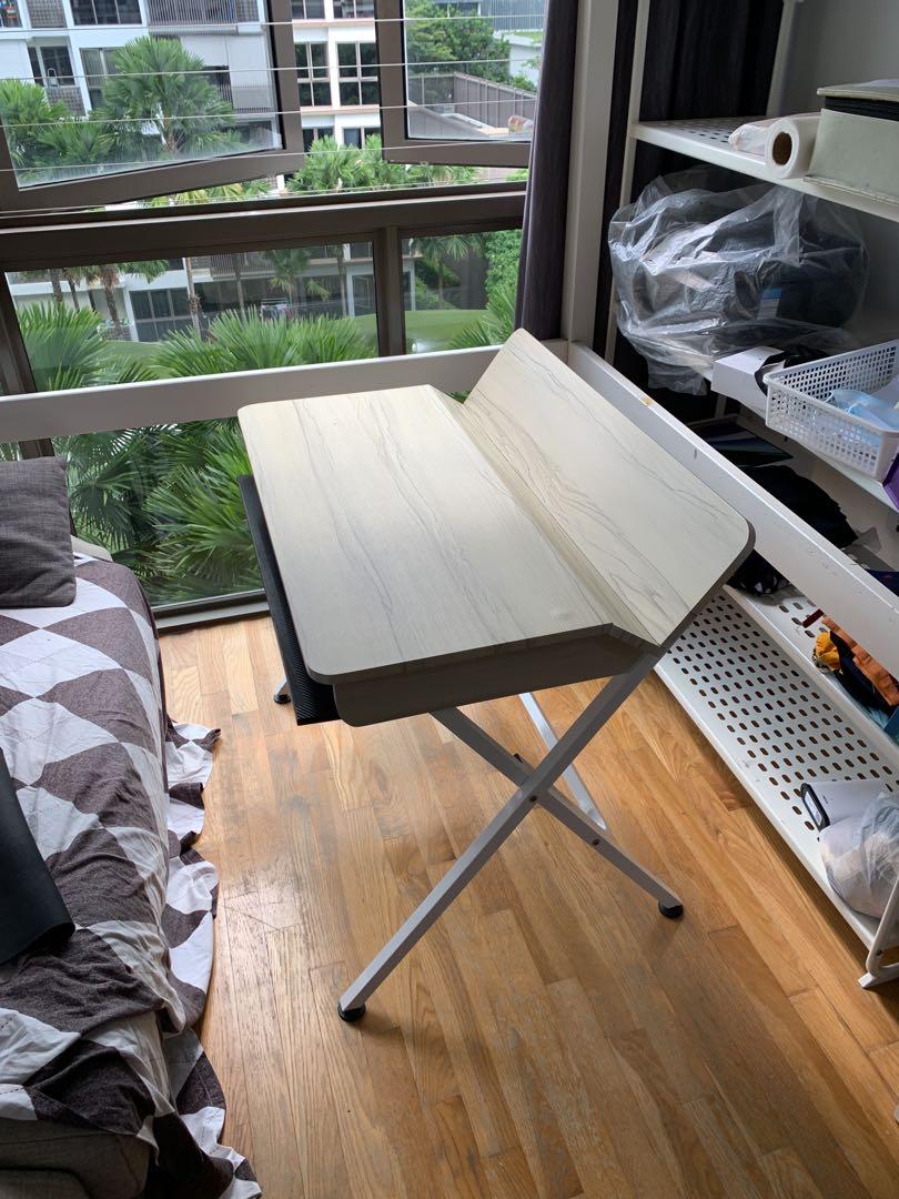 study table work table wooden rectangle table (Category: Tables & Sets) located in Singapore. Submitted by pupxll (Listing ID 1127167315, Image 3). Description: In good condition Has a removable sliding section attached to the bottom that can be used to keep keyboards etc. dimensions: length: 90cm width: 62cm height: 73.5cm.
