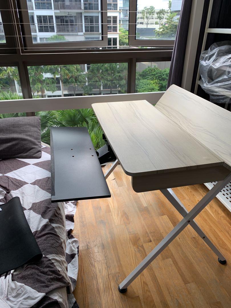study table work table wooden rectangle table (Category: Tables & Sets) located in Singapore. Submitted by pupxll (Listing ID 1127167315, Image 2). Description: In good condition Has a removable sliding section attached to the bottom that can be used to keep keyboards etc. dimensions: length: 90cm width: 62cm height: 73.5cm.