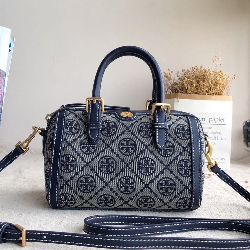 Tory Burch Monogram duffle bag boston, Women's Fashion, Bags & Wallets,  Purses & Pouches on Carousell