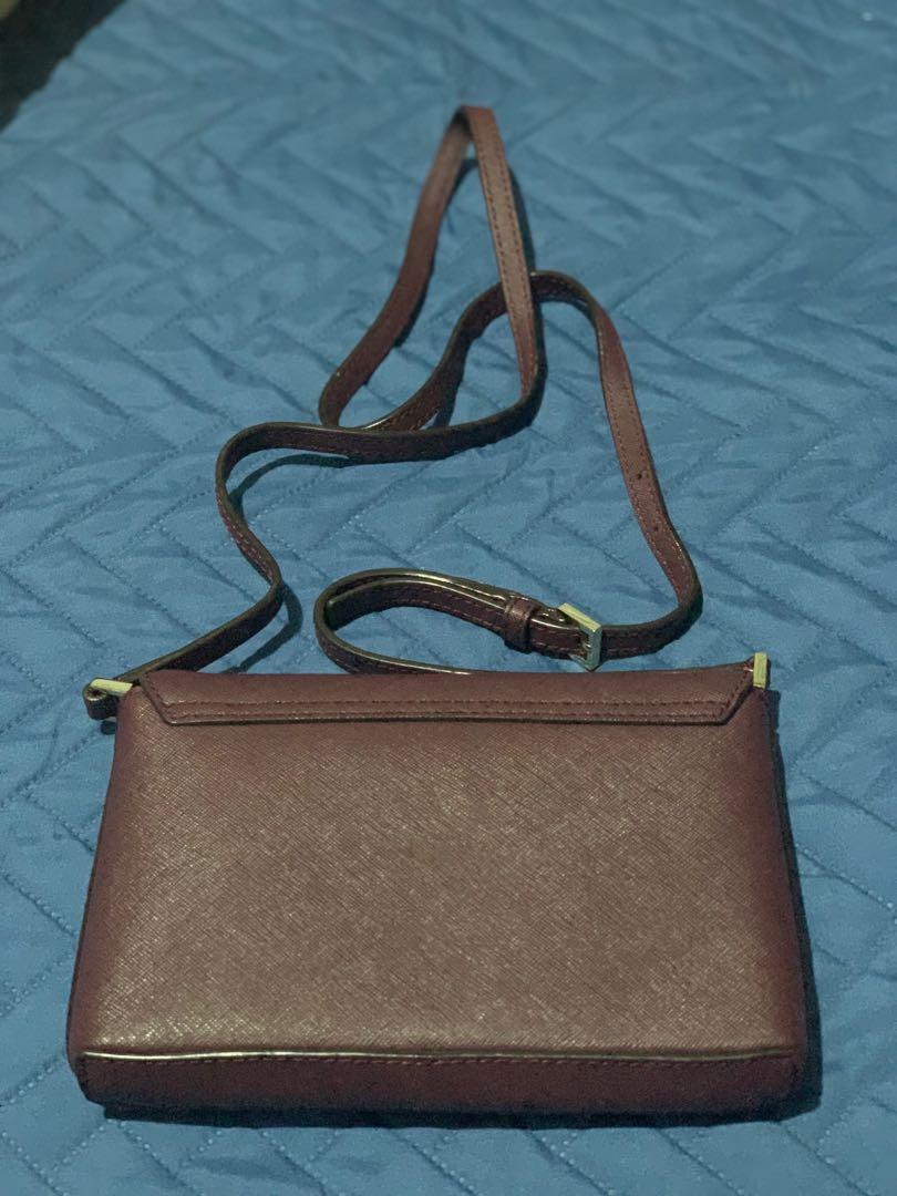 Authentic Kate Spade Sling Bag (Category: Luxury Bags & Wallets) located in Mandaluyong City. Submitted by isydln (Listing ID 1127515174, Image 3). Description: Authentic Kate Spade Newbury Lane Sally Crossbody From Hawaii Rarely used SIZE 4.9"h x 7.4"w x 1.1"d drop length: 22.5" total strap length: 45" MATERIAL crosshatched leather with matching trim small quilt lining 14-karat light gold plated hardware style # wkru3430 DETAILS crossbody with a