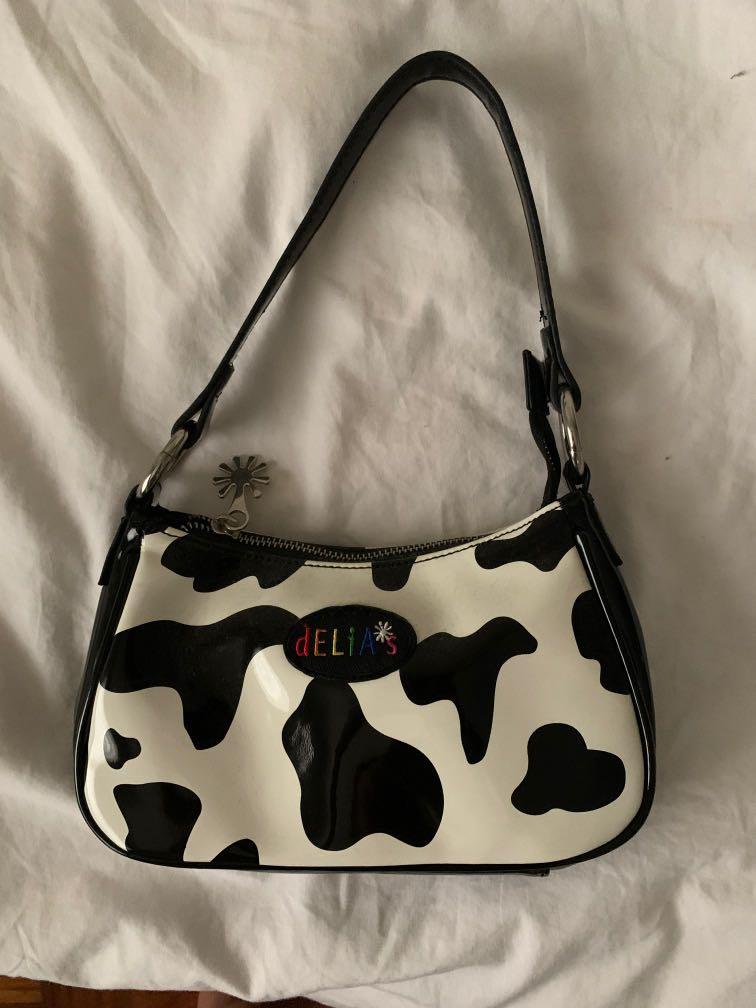Delias cow print purse deals