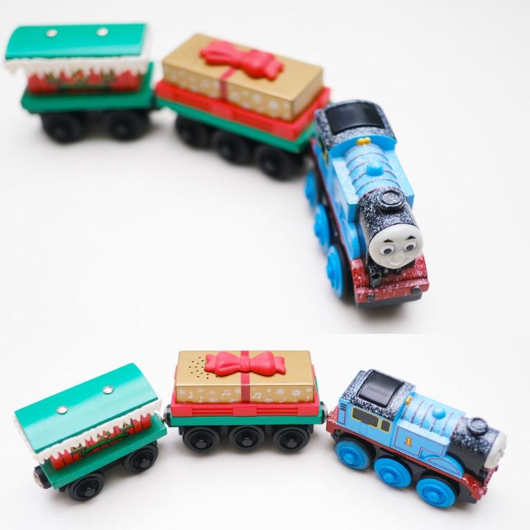 Thomas & Friends Around-The-Tree Train Set (Category: Vehicle & Diecast Models) located in Binan City. Submitted by bargainsonblock12 (Listing ID 1127426707, Image 3). Description: Thomas & Friends Wooden Railway Battery-Powered Around-The-Tree Train Set Holiday Collection Retired set Includes Snow-covered Thomas, a Musical Gift Car and Winter Caboose. Train tracks (8 straight tracks and 8 curved tracks) are also included. The tracks circle a Chr