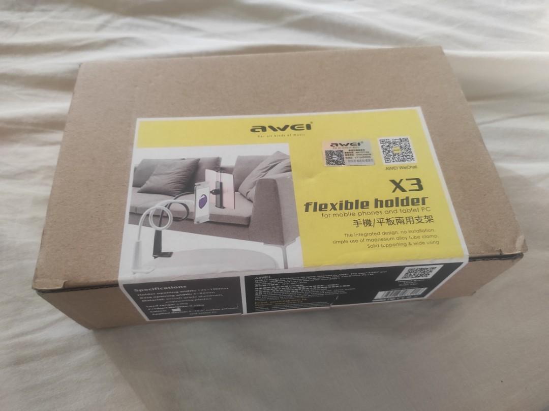Awei flexible phone & tablet holder (Category: Mounts & Holders) located in Quezon City. Submitted by pancakewhipped777 (Listing ID 1127530036, Image 3). Description: Awei Flexible phone / tablet holder Color: black Dm, Chat Carousel! or Call: 0918-287-8700 Thanks!.