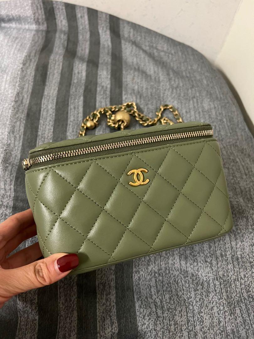 Chanel vanity case with chain gold ball green