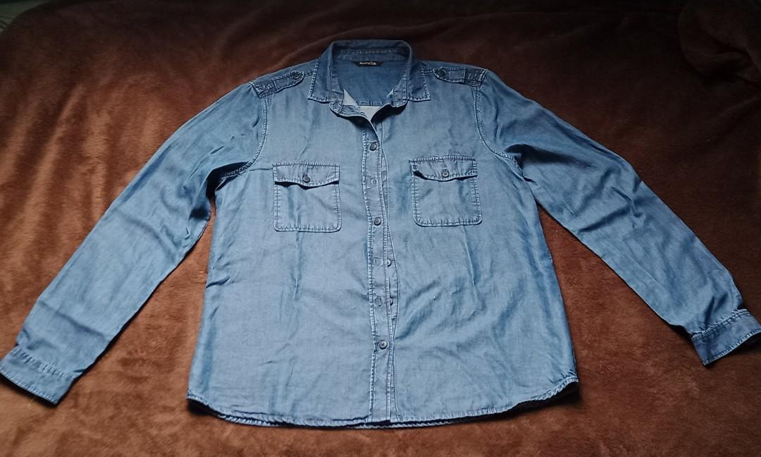 Denim Polo button up Mossimo Dutti (Women's) (Category: Longsleeves) located in Quezon City. Submitted by yellowcorner_store (Listing ID 1127541322, Image 1). Description: made in Portugal size: XL measurements: length - 28" bust - 42" sleeves length - 25" minor issue: small hole Infront (see photo).