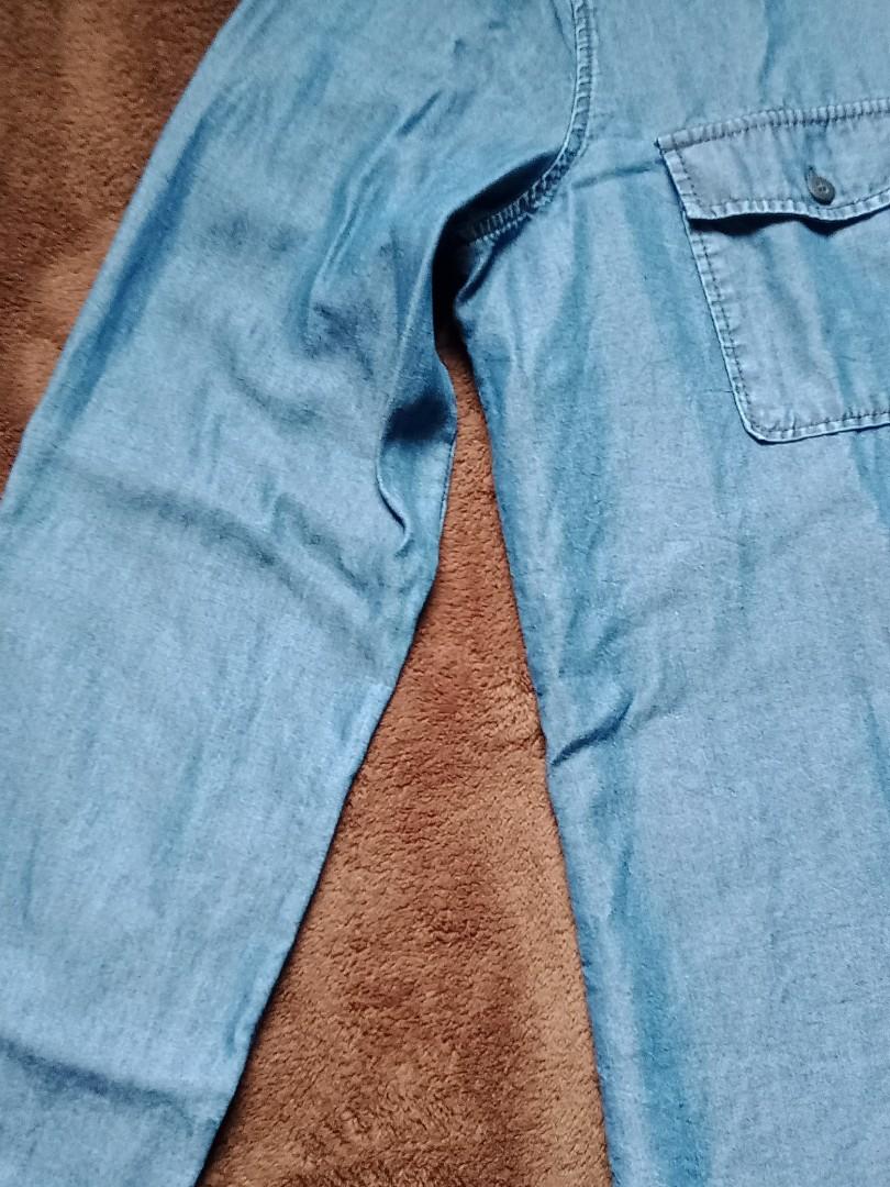 Denim Polo button up Mossimo Dutti (Women's) (Category: Longsleeves) located in Quezon City. Submitted by yellowcorner_store (Listing ID 1127541322, Image 2). Description: made in Portugal size: XL measurements: length - 28" bust - 42" sleeves length - 25" minor issue: small hole Infront (see photo).