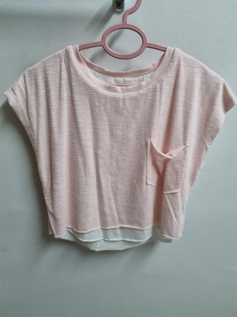 Crop top (Category: Activewear) located in Singapore. Submitted by fairladyy (Listing ID 1127584635, Image 3). Description: double layer navy blue: M light pink: S $18 mailed for each piece..