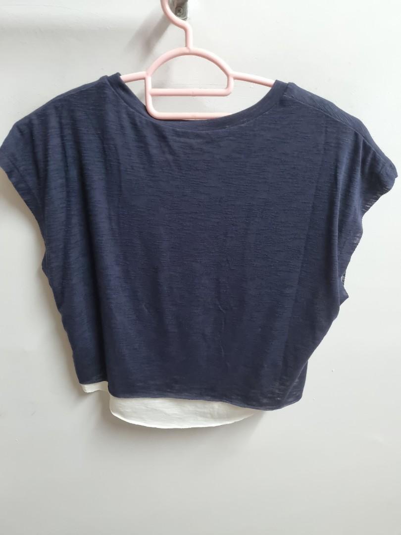 Crop top (Category: Activewear) located in Singapore. Submitted by fairladyy (Listing ID 1127584635, Image 2). Description: double layer navy blue: M light pink: S $18 mailed for each piece..
