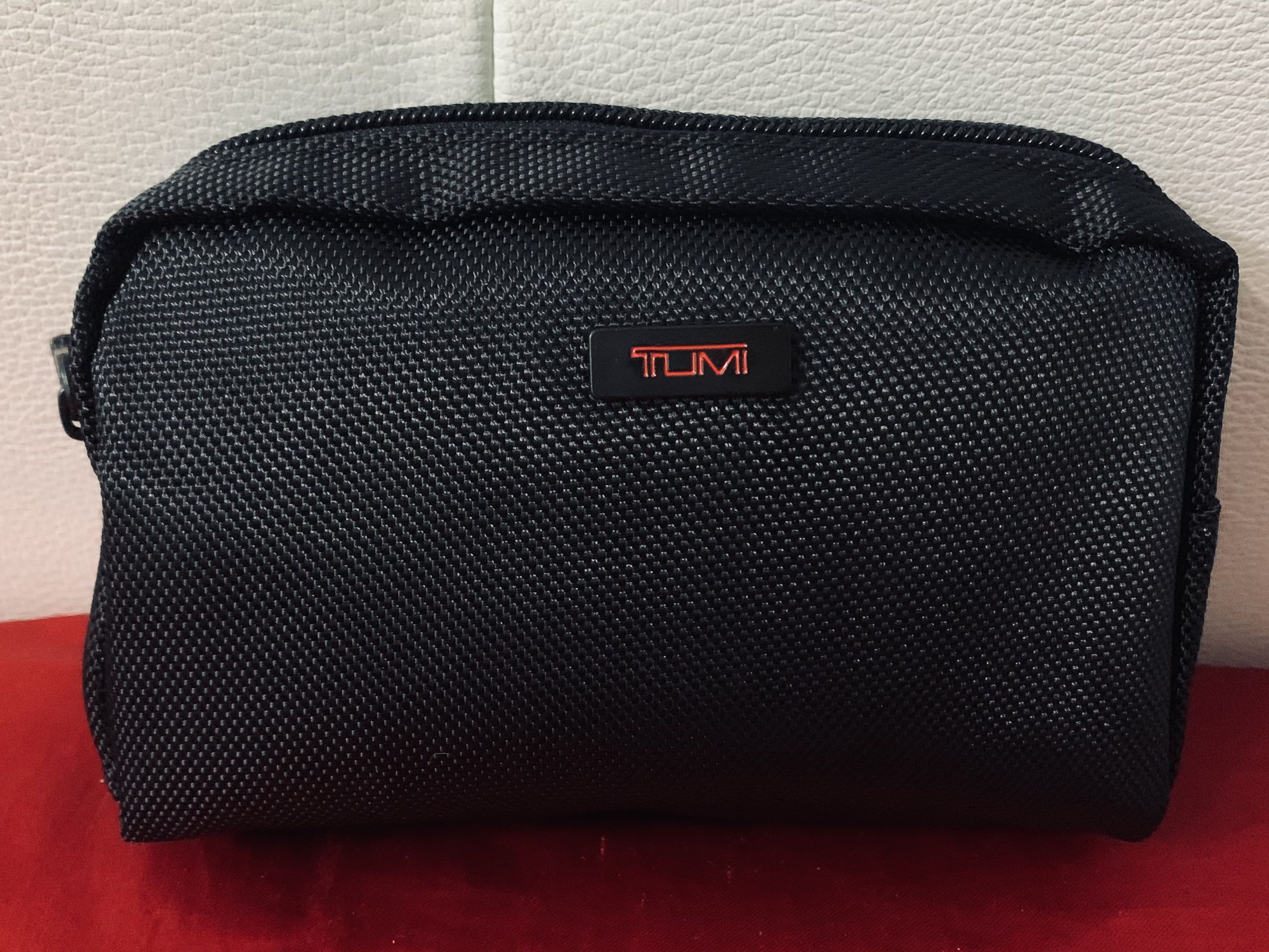 tumi pouch bag