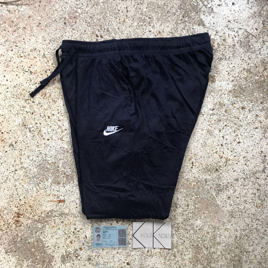 nike club jersey cuffed joggers in grey