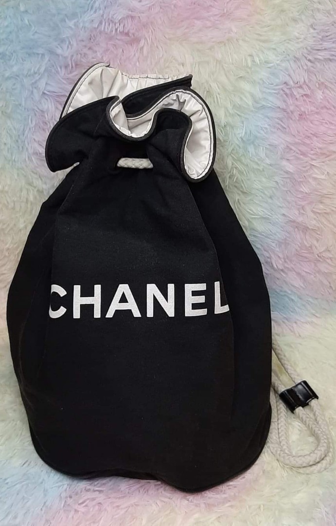 CHANEL Logo Printed Canvas Drawstring Bucket Pool Bag/Backpack, Women's  Fashion, Bags & Wallets, Backpacks on Carousell