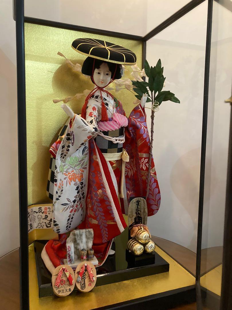 Japanese doll in glass case value store