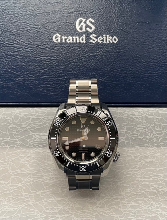 Grand Seiko SBGH255 Titanium with warranty till 2026, Luxury, Watches on  Carousell