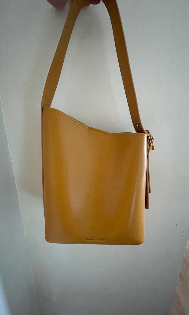 Original Charles and Keith Large Handbag (Category: Shoulder Bags) located in Manila. Submitted by bailey604 (Listing ID 1127949104, Image 2). Description: Unique design Large with inside pouch Mall bought/1st owner Selling low due to signs of usage (see pics) Rfs: declutter Orig price 4k.