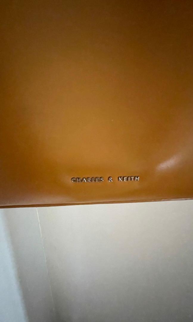 Original Charles and Keith Large Handbag (Category: Shoulder Bags) located in Manila. Submitted by bailey604 (Listing ID 1127949104, Image 3). Description: Unique design Large with inside pouch Mall bought/1st owner Selling low due to signs of usage (see pics) Rfs: declutter Orig price 4k.