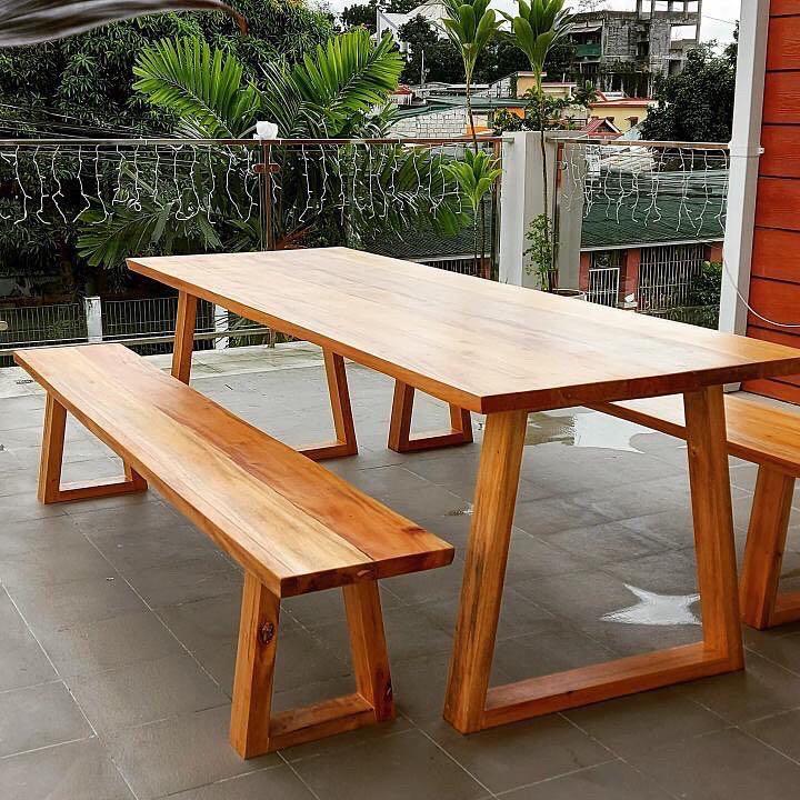 Solid Wooden Live Edge Carved Table (Category: Tables & Sets) located in Pasig City. Submitted by holzph (Listing ID 1127926383, Image 1). Description: Our mahogany dining tables can be live-edged carved on both sides for a more natural finish 🌳 This set sits 8-10 people and can be used for indoor or outdoor use. Table Measurements: Length: 244cm / 8ft Width: 84cm / 33” Height: 76cm / 30” Thickness: 3.8cm / 1.5” *our tables and benches can be cu