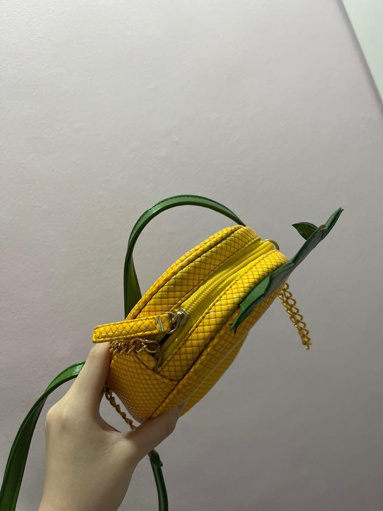 Abby Jocson Mini Pineapple Bag (Category: Purses & Pouches) located in Quezon City. Submitted by hellocaitlin (Listing ID 1128255458, Image 2). Description: - worn out around 2x! - has some minor staining in the patent leather ( just from being in storage) - slightly negotiable - can bundle with the watermelon baf - was bought for around 800 php mop: gcash/shopee checkout mod: lalamove/grab (metro manila) + shopee checkout.