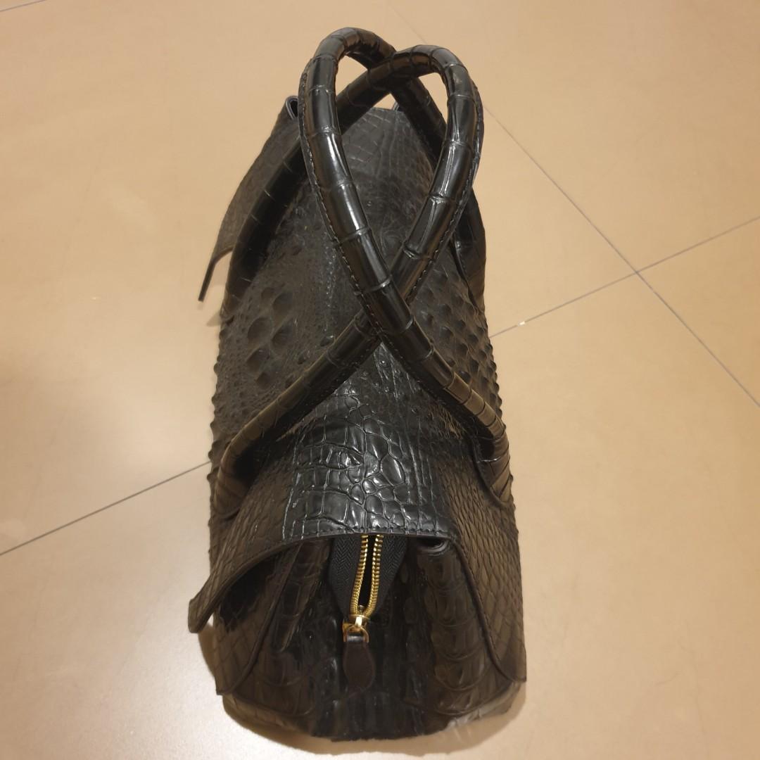 Crocodile skin deals bag brand