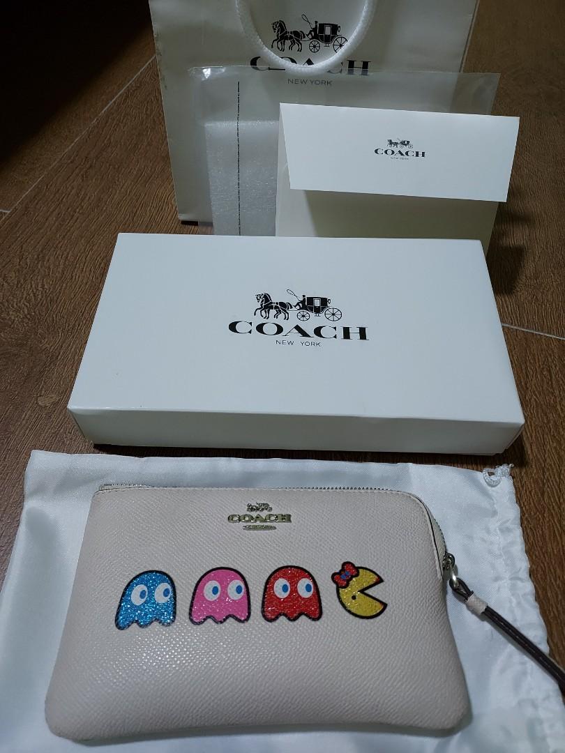 coach pac man wristlet