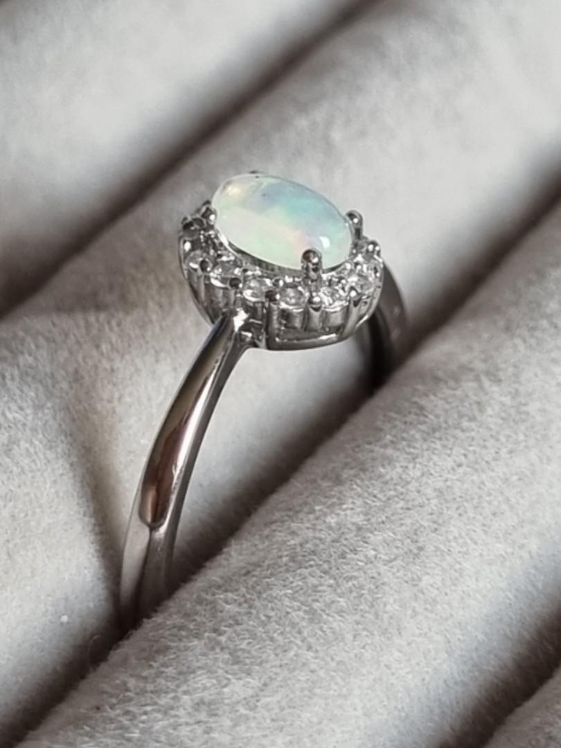 Opal adjustable ring (Category: Rings) located in Singapore. Submitted by jazdema (Listing ID 1128187566, Image 3). Description: brand new opal adjustable ring measures at 7mm x 8.5mm (with setting) comes with ring box for the first 10 buyers free postage, no meet ups p/s: Black spot in picture is natural inclusion in the gemstone but not very visible to naked eyes.