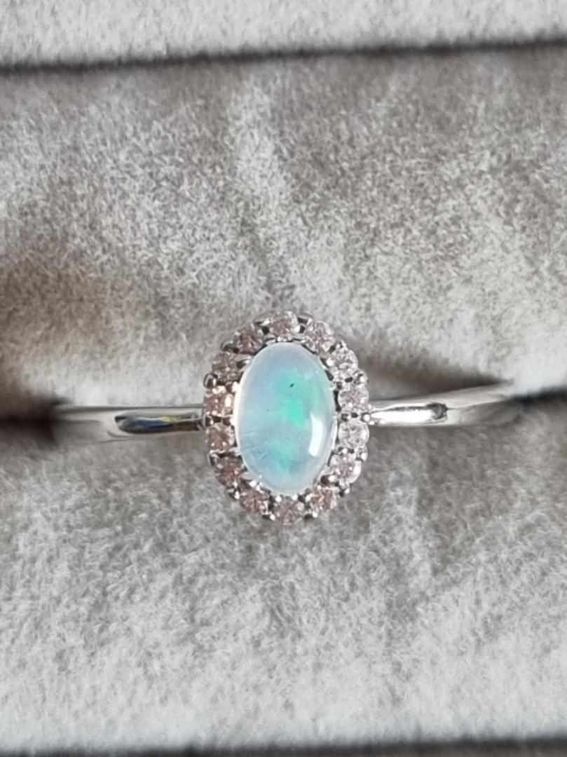 Opal adjustable ring (Category: Rings) located in Singapore. Submitted by jazdema (Listing ID 1128187566, Image 2). Description: brand new opal adjustable ring measures at 7mm x 8.5mm (with setting) comes with ring box for the first 10 buyers free postage, no meet ups p/s: Black spot in picture is natural inclusion in the gemstone but not very visible to naked eyes.