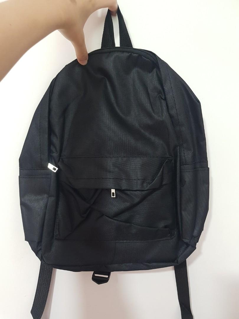 Plain Black Backpack, Women's Fashion, Bags & Wallets, Backpacks on Carousell