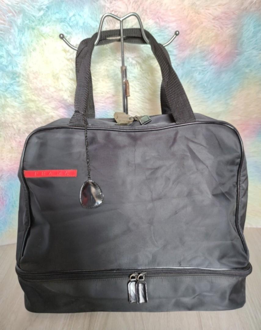 Prada Sports Duffle Bag (Category: Luxury Bags & Wallets) located in Pasig City. Submitted by armoire_deluxe (Listing ID 1128098156, Image 1). Description: Pre❤️ item. In good condition..