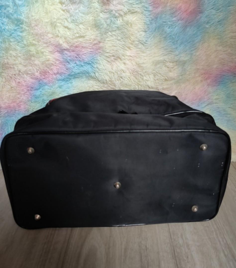 Prada Sports Duffle Bag (Category: Luxury Bags & Wallets) located in Pasig City. Submitted by armoire_deluxe (Listing ID 1128098156, Image 2). Description: Pre❤️ item. In good condition..
