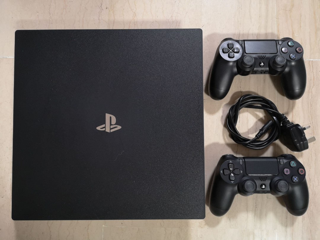 Sony PS4 Pro with 2 controllers, Gaming, Video Consoles, PlayStation on Carousell