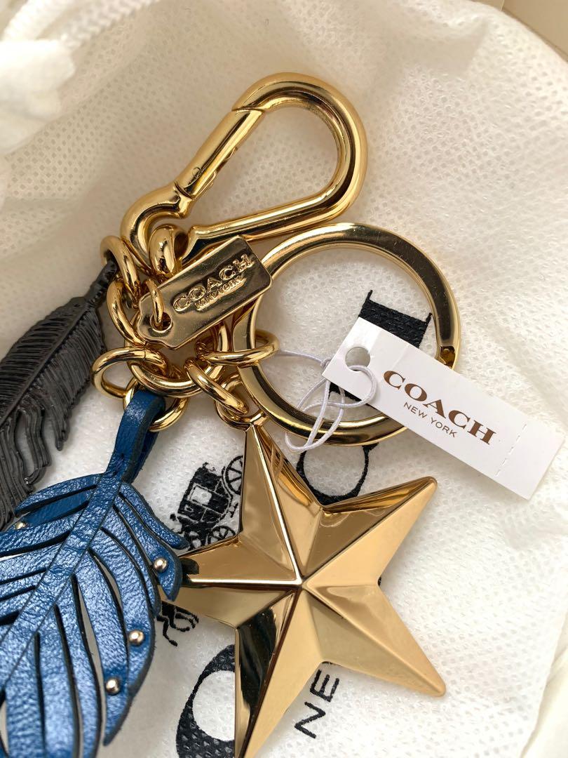 COACH royal blue feather bag charm