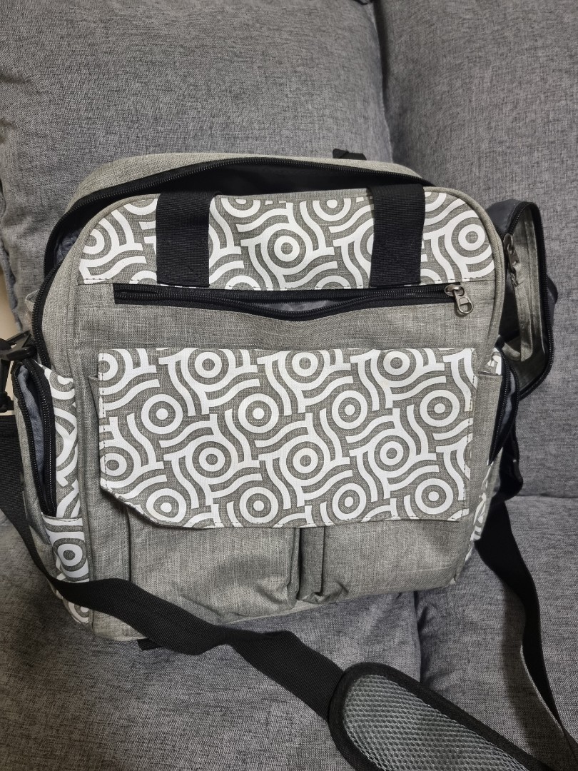 Sling backpack sales diaper bag