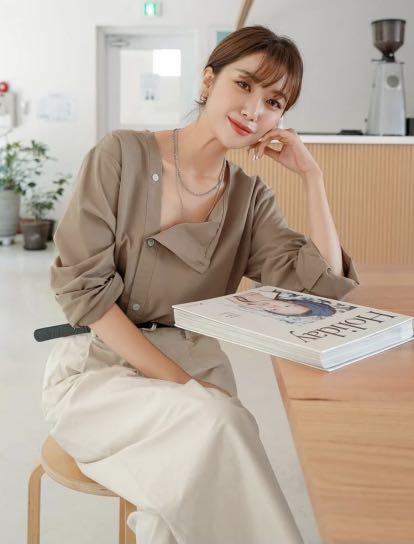Oblique Button front solid blouse (Category: Blouses) located in Singapore. Submitted by nad. (Listing ID 1128301164, Image 1). Description: Impulse buy, never worn out before..