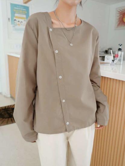 Oblique Button front solid blouse (Category: Blouses) located in Singapore. Submitted by nad. (Listing ID 1128301164, Image 3). Description: Impulse buy, never worn out before..