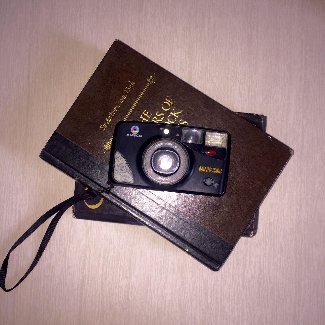 Vintage Ansco Mini Power Zoom Wide (Category: Cameras) located in Magalang. Submitted by movingoutthings (Listing ID 1128107578, Image 1). Description: Brand: Ansco (Original) Mini Power Zoom Wide Wide lense: 28 to 52 mm Color: Black Power zoom Has auto flash Has red eye reduction Has DX film sensing With hand strap, which makes it easy to hold! Film camera is working, just need to buy batteries and film roll😊 [Film point and shoot this camera c