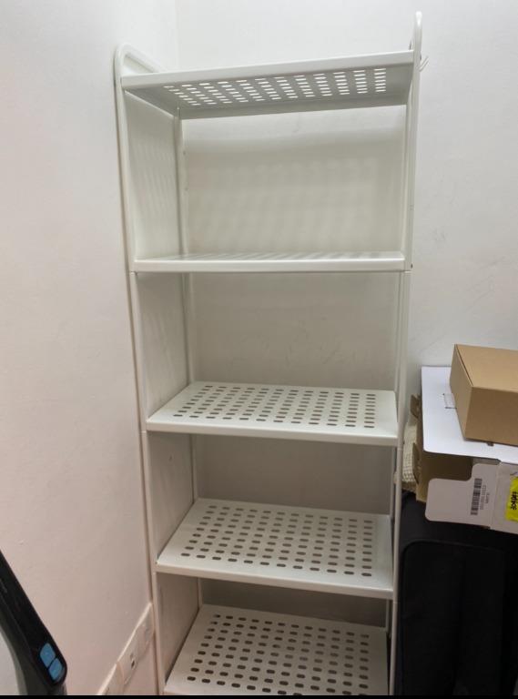 White metal Ikea shelves perfect for storage spaces and bomb shelter