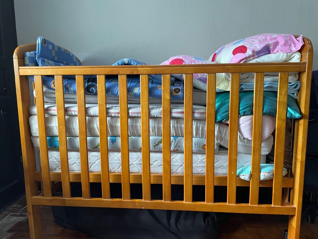 Wooden cot on wheels, Babies & Kids, Baby Nursery & Kids Furniture