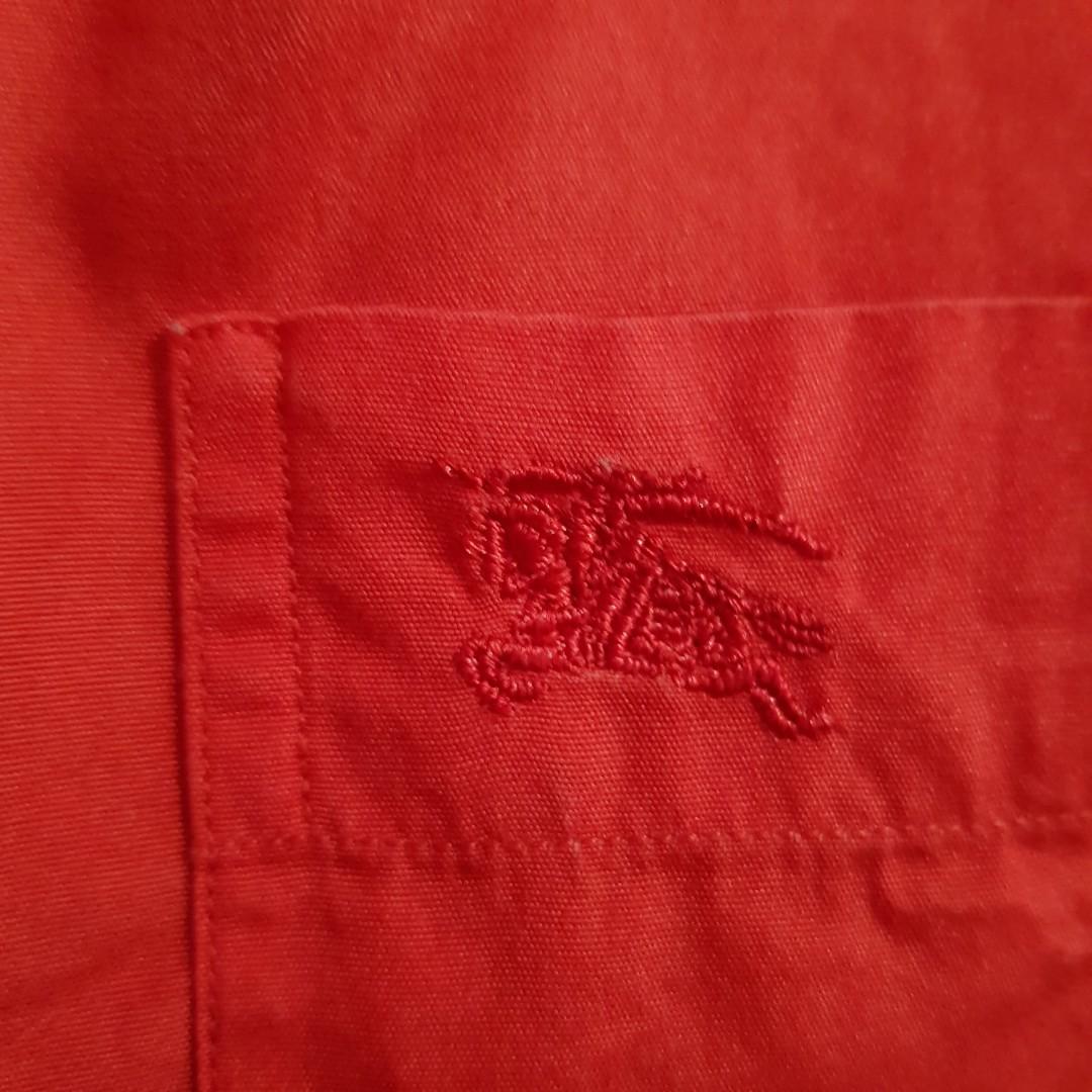 Burberry button down (Category: Tshirts & Polo Shirts ) located in Makati City. Submitted by playerplusone (Listing ID 1128529342, Image 3). Description: Color is darker in person. RFS: di na kasya; decluttering. Price is negotiable..